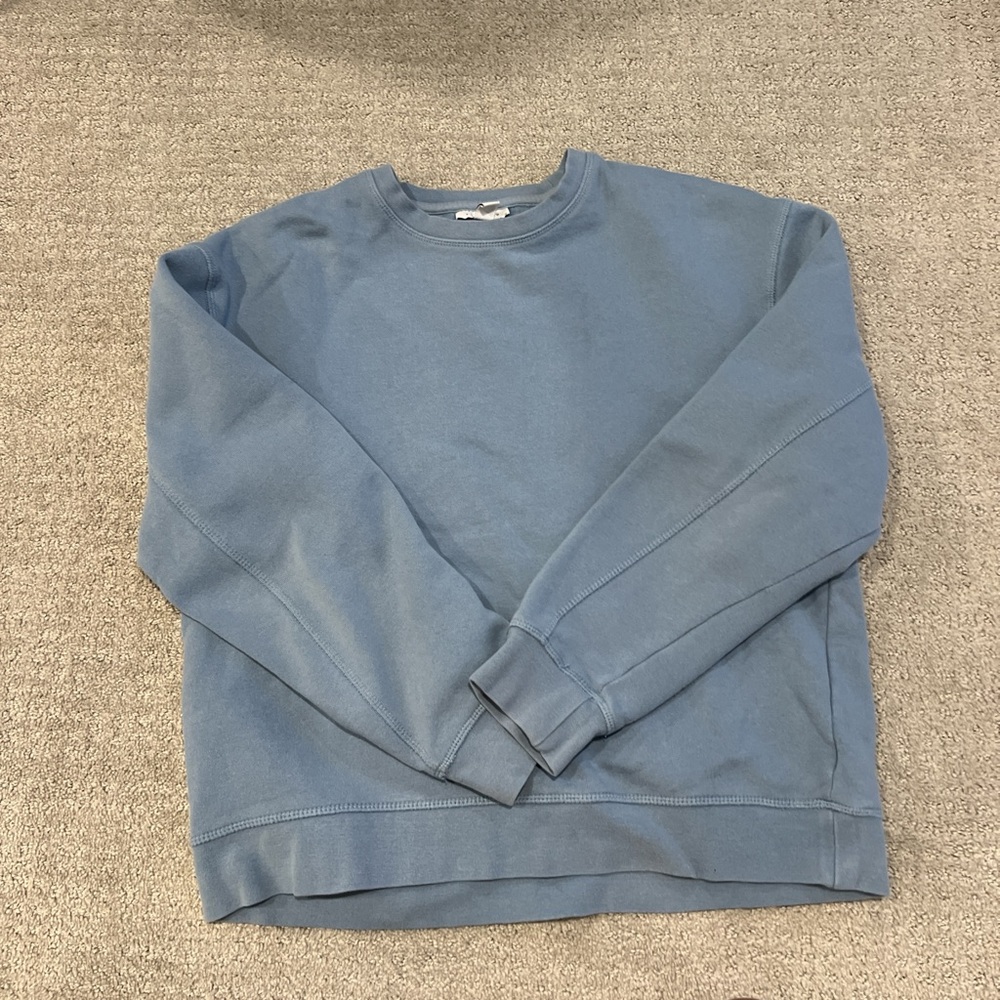 Woman’s Blue Sweater